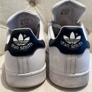 Adidas Stan Smith white sneakers with navy blue accent on heel. Size 10